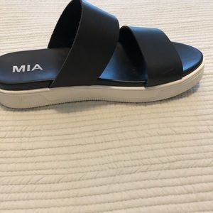 Mia black sandal with white soles, size 6 1/2. Worn only a couple of times.